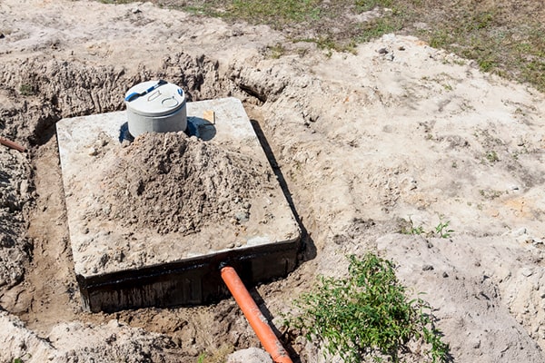 signs that your septic tank needs pumping include slow drainage, foul odors, and sewage backups in the house or yard